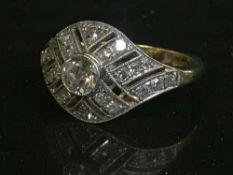 An 18ct gold diamond set Art Deco ring
