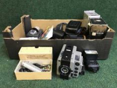 A box of assorted cameras, camera cases, accessories,