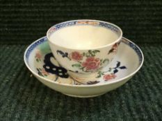 A late eighteenth century Lowestoft china teabowl and saucer, Redgrave pattern,