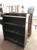 A pair of oak open shelves and a towel rail