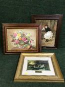 A box of assorted pictures and prints