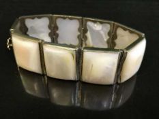 A silver and mother of pearl panel bracelet