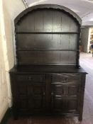 A carved oak dresser