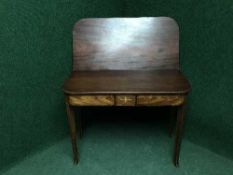 A 19th century inlaid mahogany tea table