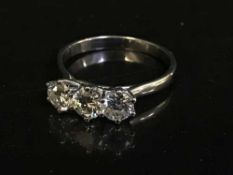 An 18ct white gold diamond three stone ring, approximately 1.5ct.