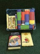 A box of assorted Harry Potter volumes and CS Lewis Chronicles of Narnia