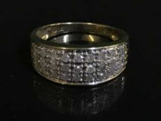 A diamond set gold bombay style half eternity ring approximately 0.5ct.