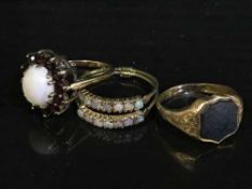 Three vintage gold rings including opal cluster,