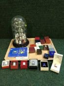 A thimble display stand and a quantity of china thimbles