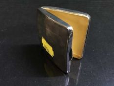 A small silver box by Walker & Hall