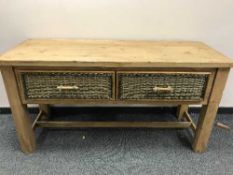 A reclaimed pine two drawer side table,