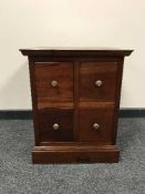 A mahogany four drawer square chest,