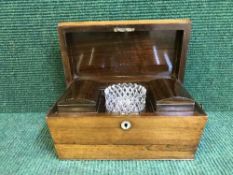 A 19th century rosewood tea caddy