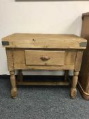 A reclaimed pine single drawer butcher's block