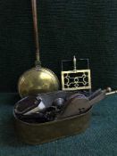 A brass bed pan, brass bucket, bellows,