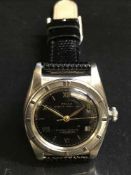 A vintage Rolex bubble back Oyster stainless steel wrist watch, numbered 458722.