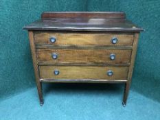 An Edwardian three drawer mahogany chest