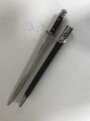 An Admiralty issue Wilkinson Sword Bayonet 1907 design with scabbard