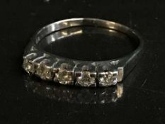 An 18ct white gold five stone diamond ring