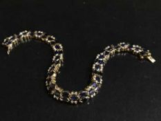 A diamond set bracelet in yellow gold, 18.
