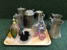 A tray of perfume bottles, pewter flagon and other similar mugs,