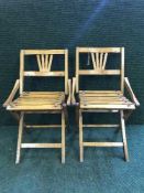 A pair of folding child's chairs