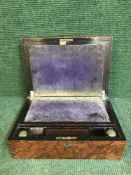 A Victorian birds eye maple and mother of pearl writing slope with two ink wells