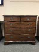 A Georgian mahogany five drawer chest,
