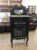 A Victorian mahogany mirror backed cabinet