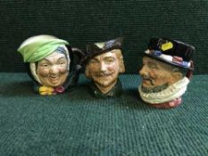 Three Royal Doulton character jugs - Beefeaters and one other
