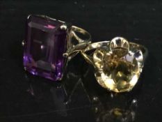 Two 9ct gold dress rings set with citrine and amethyst.