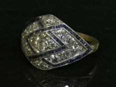 An 18ct diamond and sapphire Art Deco style cluster ring