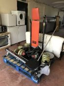 A collection of weight training equipment