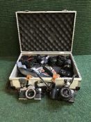 A box of assorted cameras and accessories,