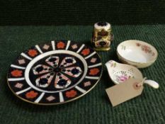 A Royal Crown Derby Imari pattern plate, number 1128 and similar lidded caddy,