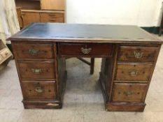 A mahogany twin pedestal desk