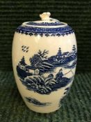 An eighteenth century Caughley china blue and white lidded jar, height 12 cm.