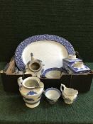 Two boxes of blue and white Willow pattern tea and dinner ware