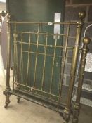 A Victorian brass single bed