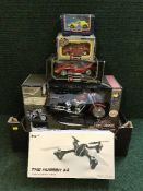 A box of boxed Hubsan RC helicopter, die cast metal model cars,