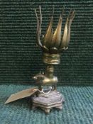 An Eastern brass incense burner