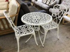 A cast metal white painted garden table and two chairs