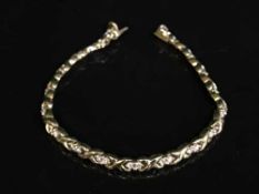 An 18ct gold bracelet set with thirty-six diamonds approximately 1ct, 14.95g.