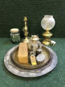 A tray of converted oil lamp, jar of marbles, gallery tray,