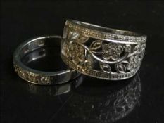 Two 18 carat white gold diamond set rings 9 grams
