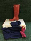 A boxed pair of Hunter wellington boots