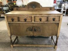 A carved oak sideboard