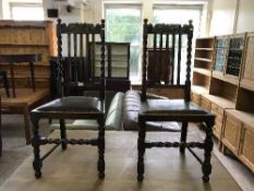 A pair of oak barley twist chairs