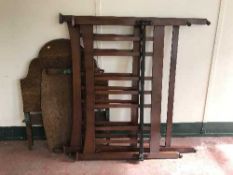 A pair of oak bedends and a pair of inlaid bedends