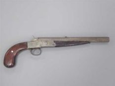 A 19th century rim-fire target pistol, by James Burrow of Preston, with a 27.